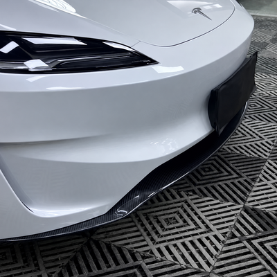 Gloss carbon fiber front lip installed on Tesla Model 3 Highland Performance - view 1