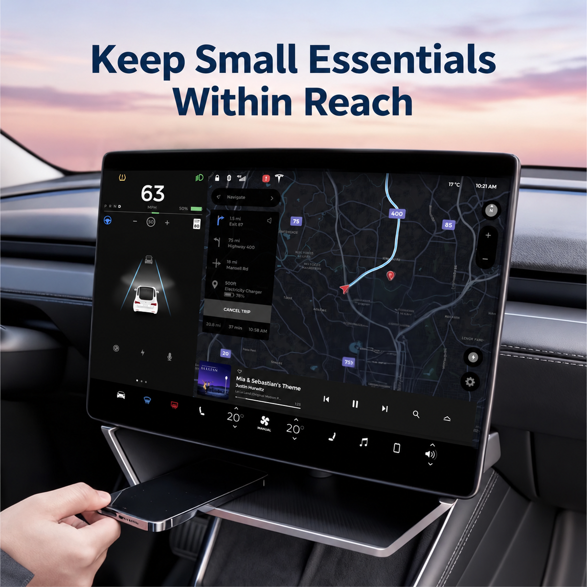 Tesla magnetic under-screen storage tray holding a phone